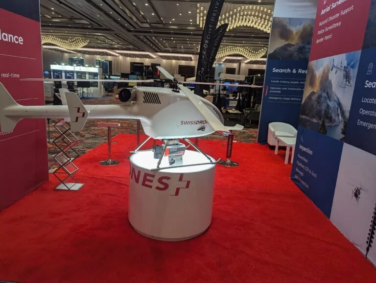 A photo of an Unmanned helicopter on display at an expo