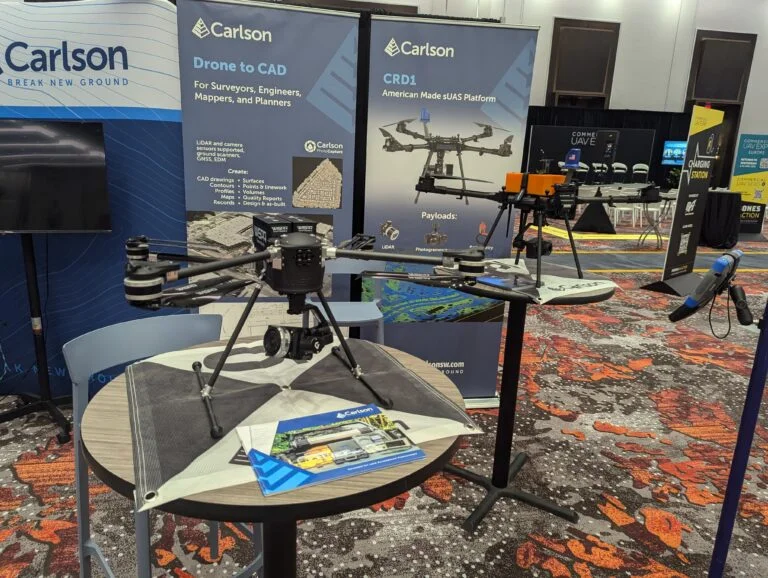 A photo of a big rotary drone on display at an expo