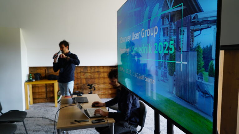 Two men presenting at a conference